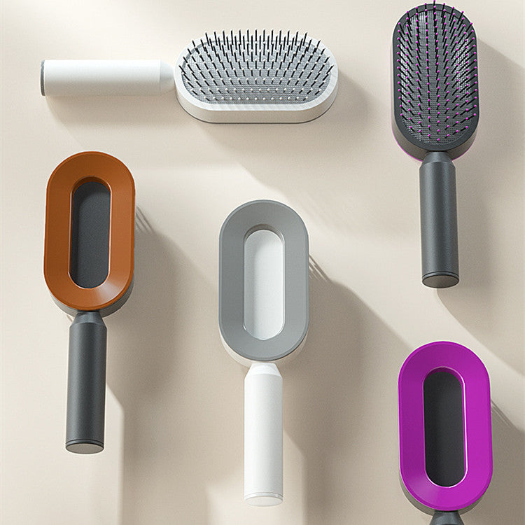 Women's self-cleaning hair brush